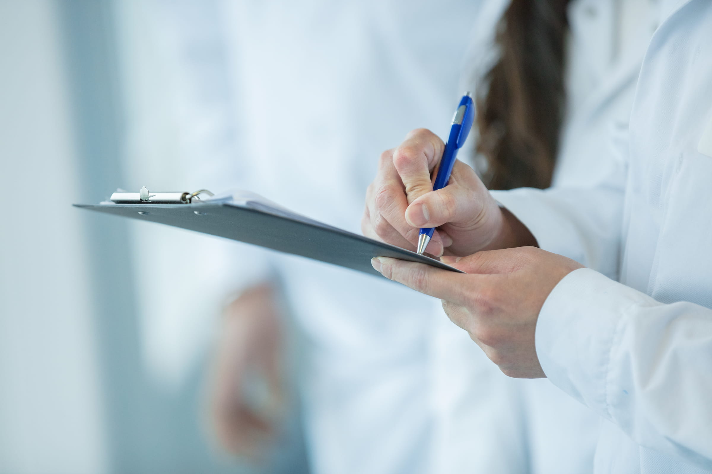 Drs with clipboard - CSL site