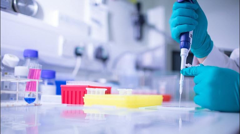 Sequiris Liverpool researcher in laboratory